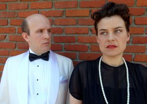 John (Dylan Bailey) and Henrietta (Jennifer Sperry) are caught in a web of deception. Photo