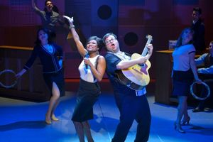 DeQuina Moore and Jay Klaitz (center) with the cast Photo