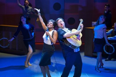 DeQuina Moore and Jay Klaitz (center) with the cast Photo