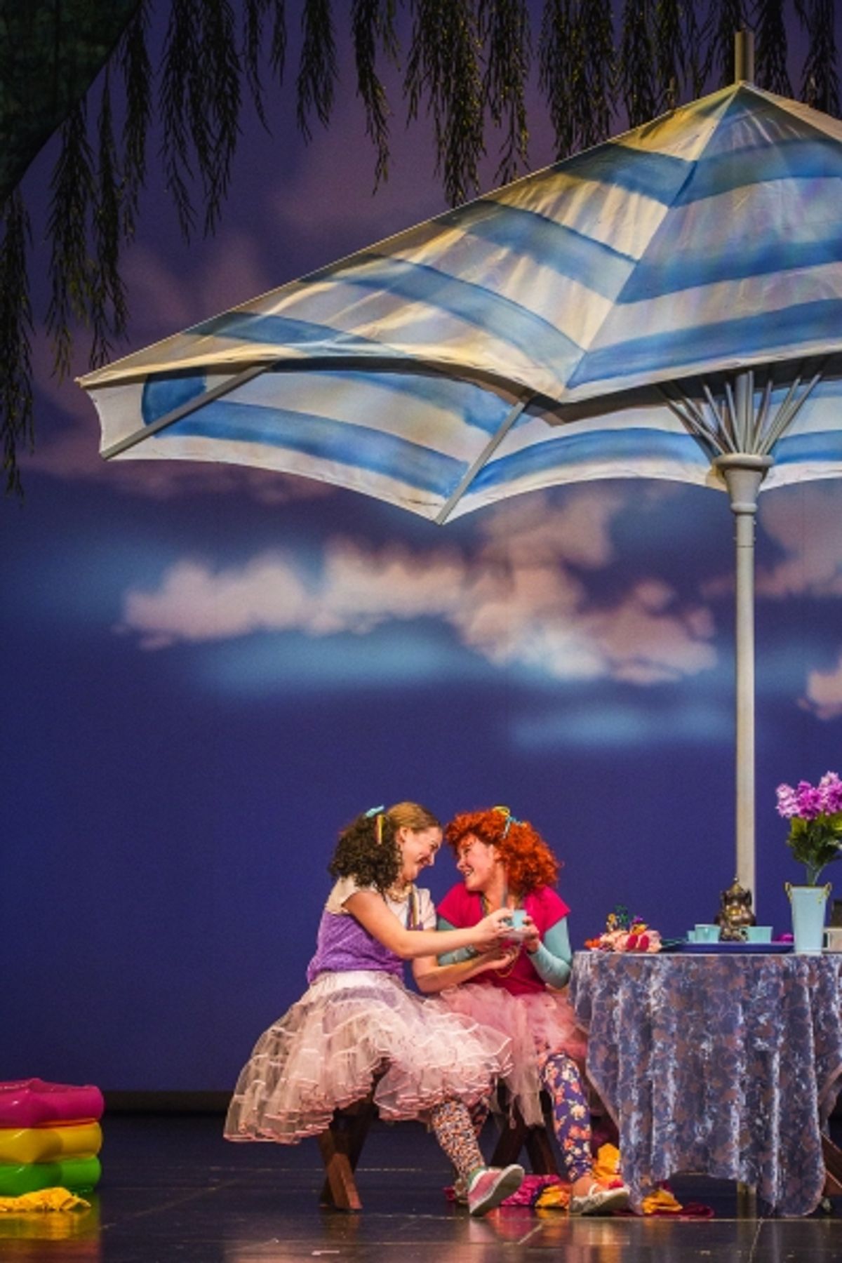 Bree (Haley Ward) and Nancy (Madison Wray) perk up over a pot of tea at 