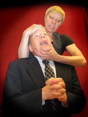 Karen Ball as Hamlet and Randall Tuttle as Claudius Photo