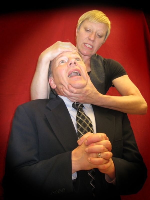 Karen Ball as Hamlet and Randall Tuttle as Claudius Photo