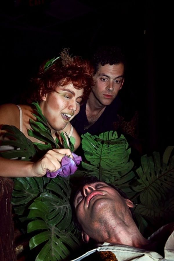 Oberon (Aaron Echegaray) angered by Puck''s (Helen Rios) mistakes, watches invisible  Photo