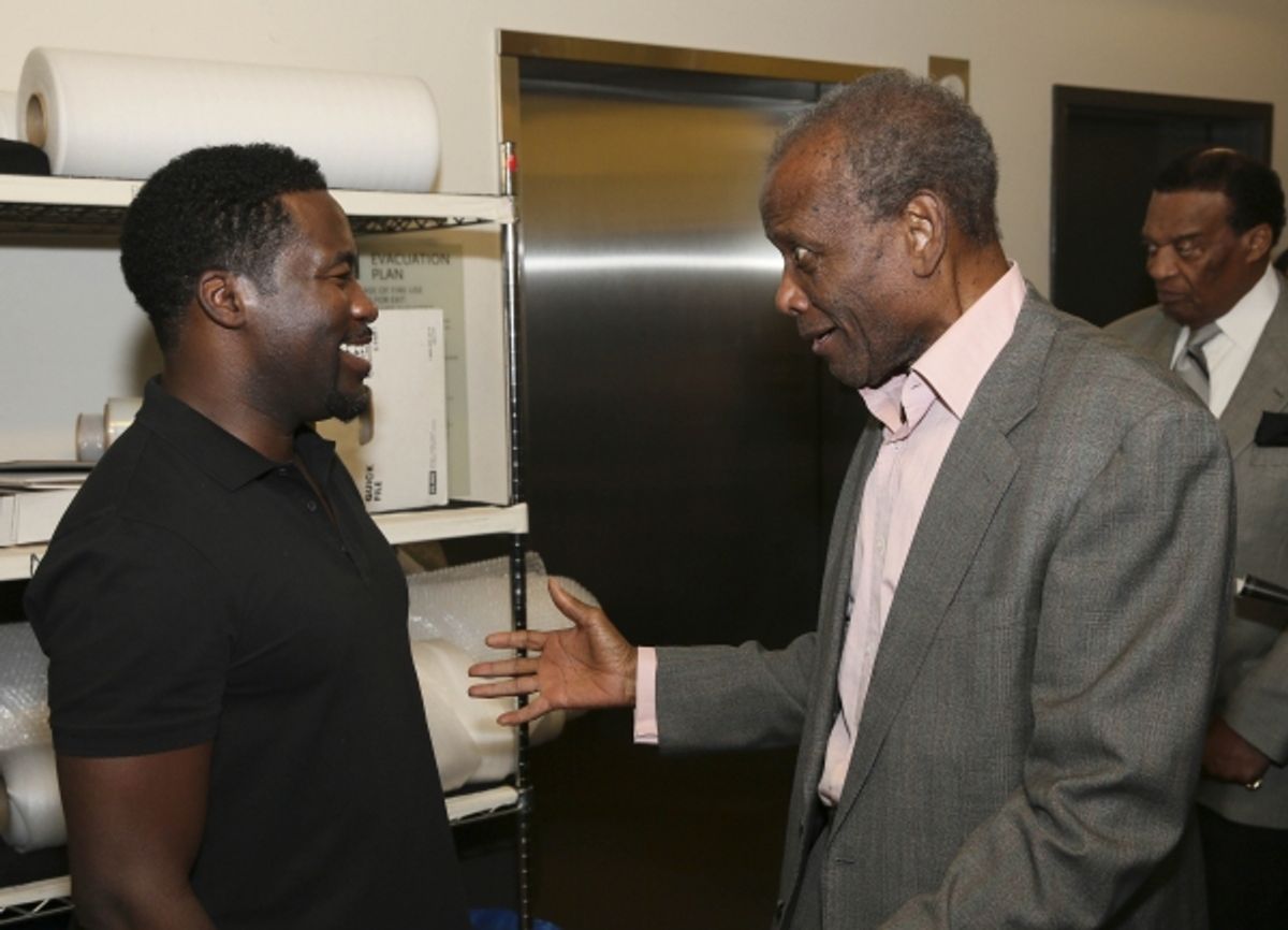 Daniel Beaty is congratulated by actor Sidney Poitier at 