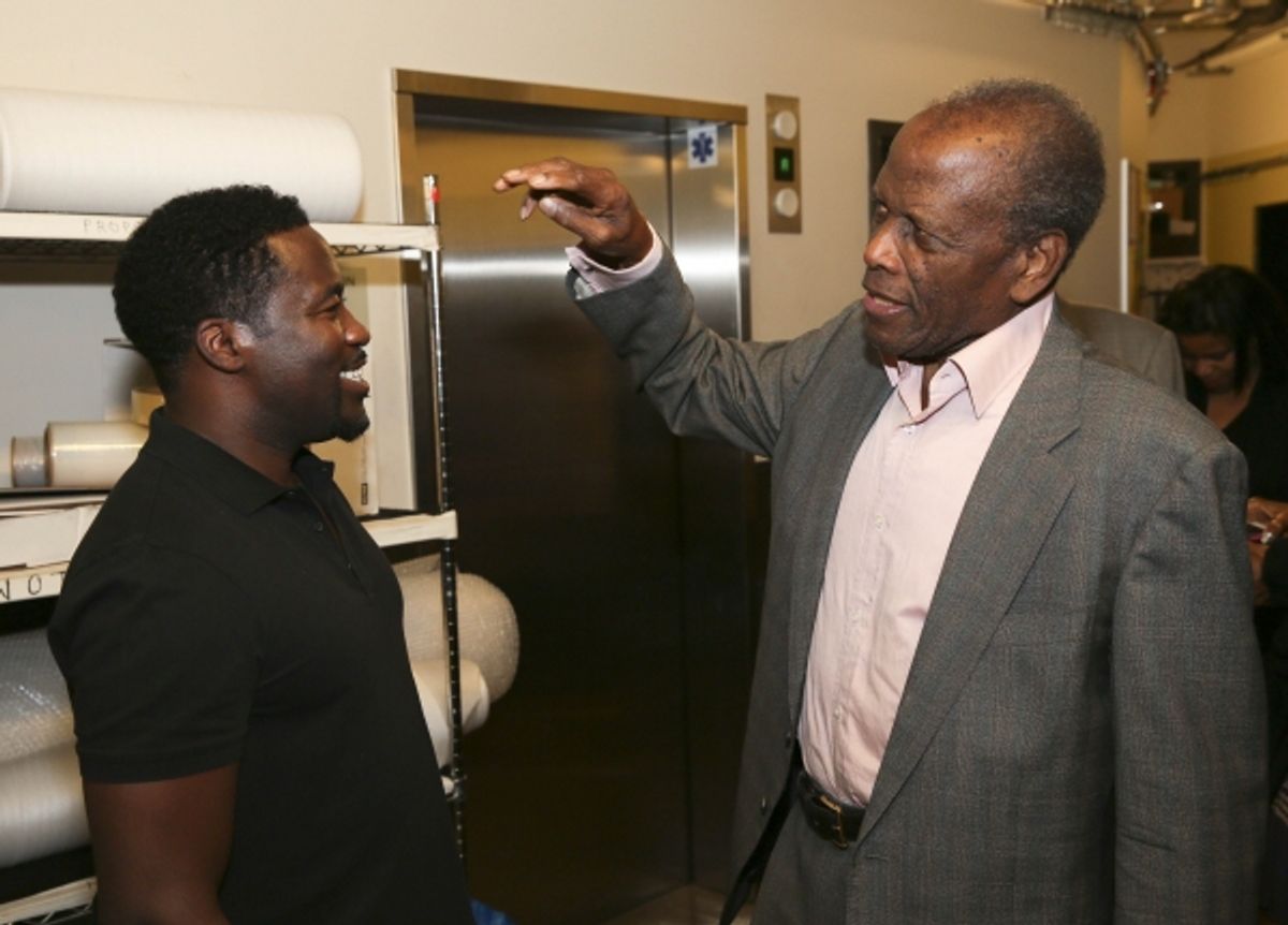 Daniel Beaty is congratulated by actor Sidney Poitier at 