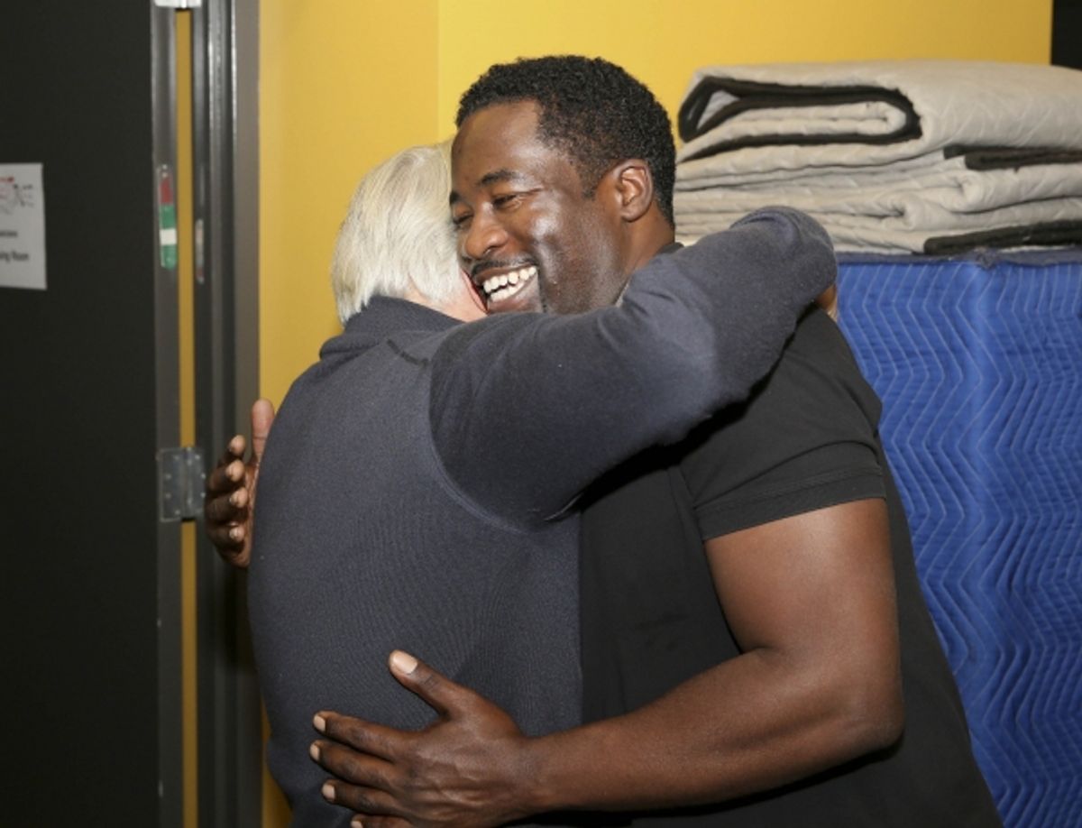 Martin Sheen hugs Daniel Beaty at 