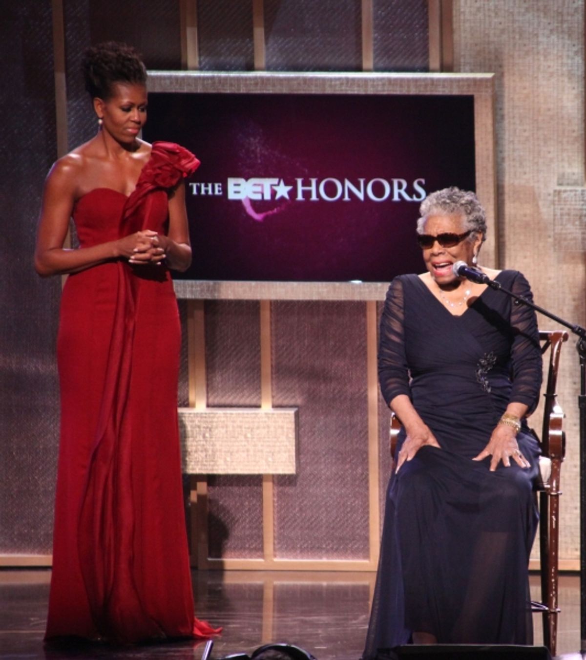 Michelle Obama with Maya Angelou on stage during the BET Honors 2012 at the Warner Theatre on January 14, 2012 in Washington, DC. at 