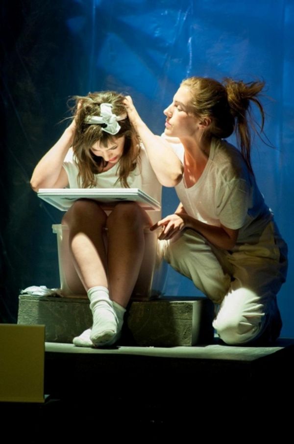 Simonne tends to Jean-Paul Marat played by Charlotte Pines. Photo