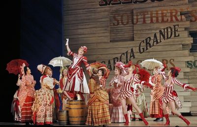 Kirsten Wyatt (Ellie Mae Chipley) with chorus and dancers Photo