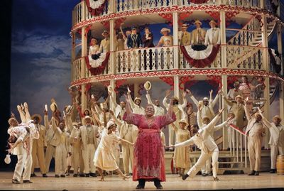 Angela Renee Simpson (Queenie) with chorus and dancers Photo