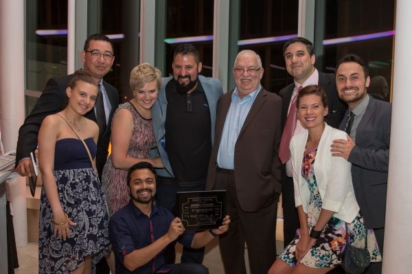 Bareburger Team with award - center: Euripides Pelekanos and his wife Photo