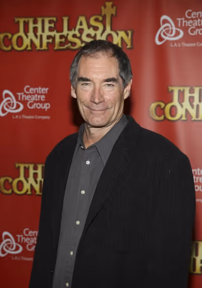 Actor Timothy Dalton poses during the arrivals for the opening night performance of ' Photo