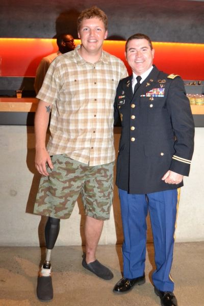 (L to R) Company member Paul Hurley and U.S. Army Captain Steve Scuba at the opening  Photo
