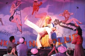 Aaron Dore as Luther Billis aka Honeybun with Katie Clark as Nellie Photo