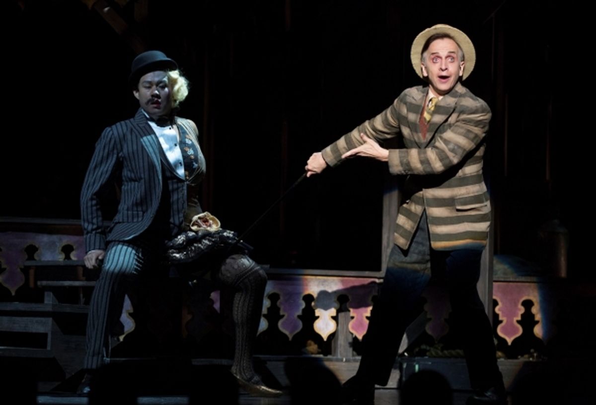 Kelvin Moonloh as Halfman-Halfwoman and Robert Joy as Sir at 