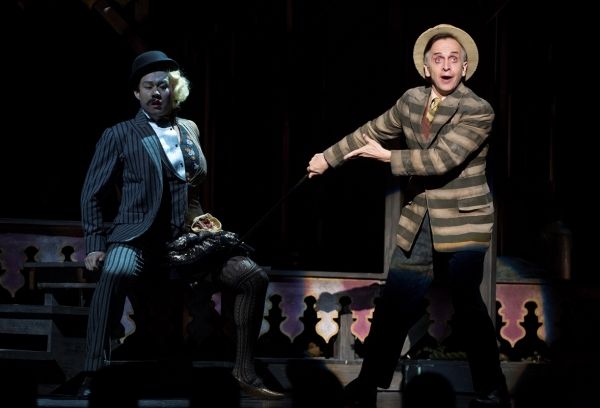 Kelvin Moonloh as Halfman-Halfwoman and Robert Joy as Sir Photo