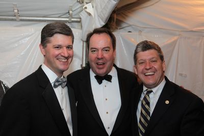 Mayor Scott Slifka, Chuck Coursey, and town council member Burke Doar support the May Photo