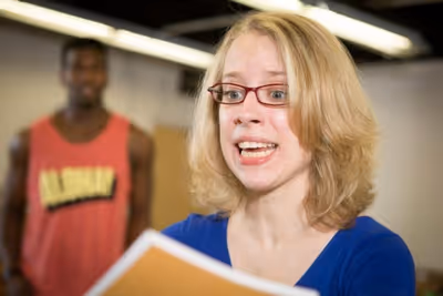 Alyse Alan Louis, (Khris Davis, background) Photo