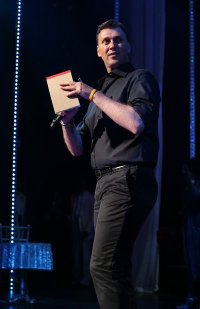 Director Warren Carlyle with the ensemble cast  Photo