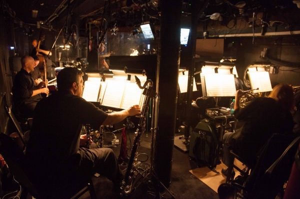 The LES MIZ orchestra getting warmed up for the performance. Photo by Max Gordon Phot Photo