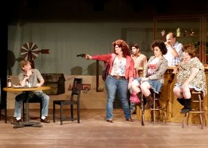 Noleta takes revenge on her cheating husband. (from left) Harold Dershimer, Elizabeth Photo