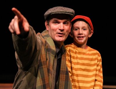 Edward J. MacLennan as Edward Bloom and Landon Barnickel as Young Will Photo