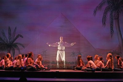 Title character Joseph (Ian Patrick Gibb) magically appears, singing ''Any Dream Will Photo