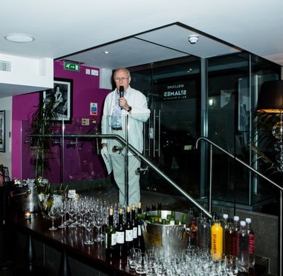 Sam Walters gives a speech at the opening night party for INVINCIBLE Photo