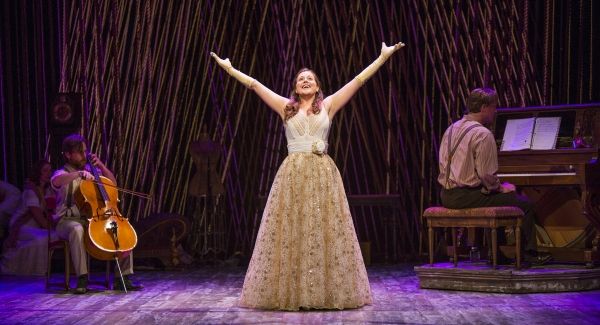Claire Karpen as Cinderella with (background, from left) Jessie Austrian, Paul L. Cof Photo