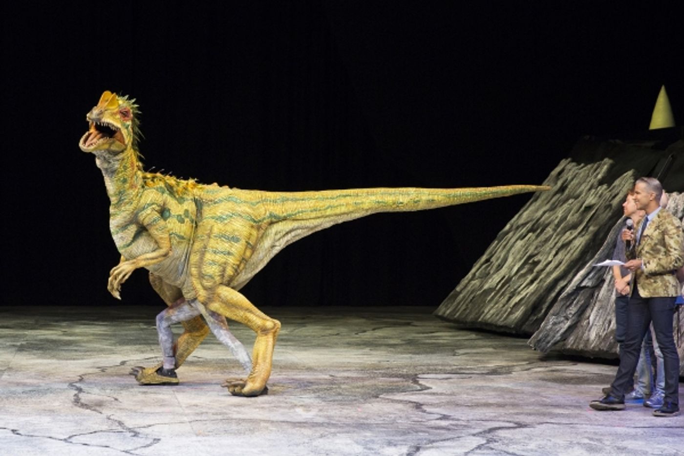 Photo Flash: WALKING WITH DINOSAURS Struts the Catwalk with 'Dinosaur Feathered Fashion Show'  Image