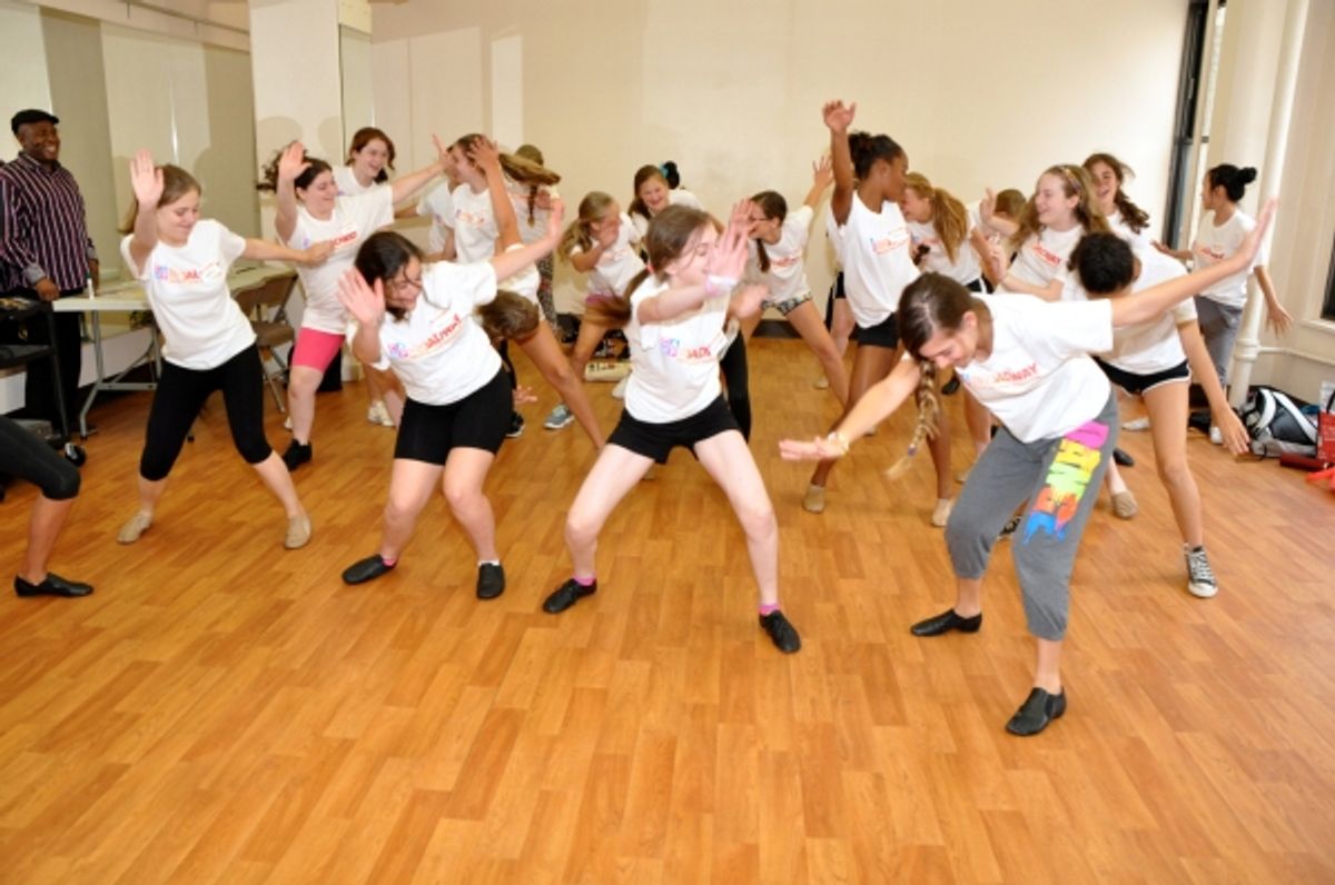 The Camp Broadway Kids showing off dance moves they learned from Ron Kunene at 