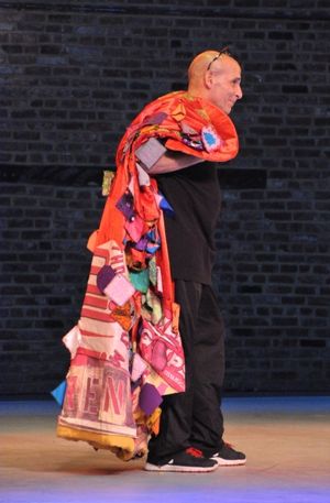 Jonathan Cerullo bringing out The Camp Broadway Robe that the students made the patch Photo