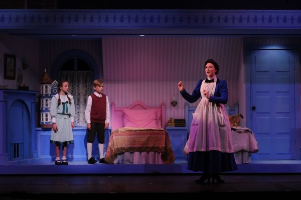 Mary Poppins (Catharine Kay) with Jane (Ella Schnoor) and Michael (Tyson Francis) in  Photo