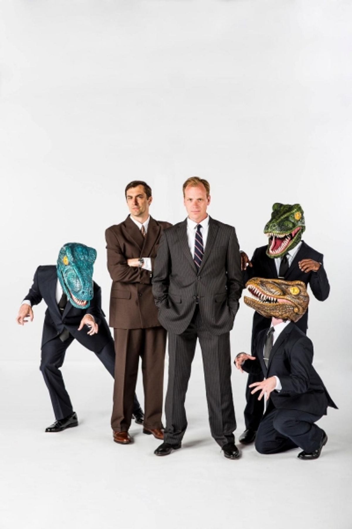 Steve Hartman as Raptor, Chris Shonka as Andy Fastow, Matthew Pyle as Jeffrey Skilling, Lamar Brown (standing) as Raptor, Jon Roberson (kneeling) as Raptor at 