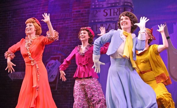  Tapping feet click happily on New York streets as Annie (Amy Baker Schwiethale), Phy Photo