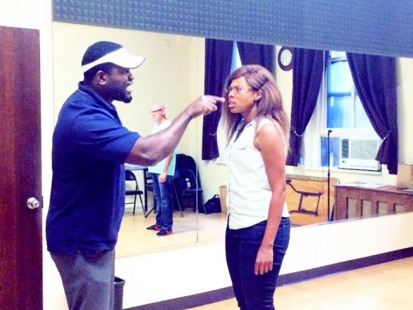 Ron Denson as Louis McKay and Alana Inez as Laura ''Big Red'' Livingstone. Photo