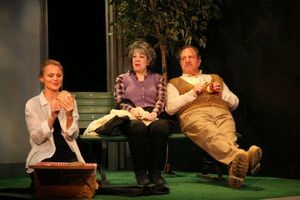 Alexis (Celia Schaefer) imagines picknicking with her parents (Gillien Goll and Bob A Photo