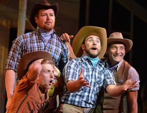 Will Parker (Daniel S. Hines), center, tells his friends Shorty (Jordan Moody), botto Photo