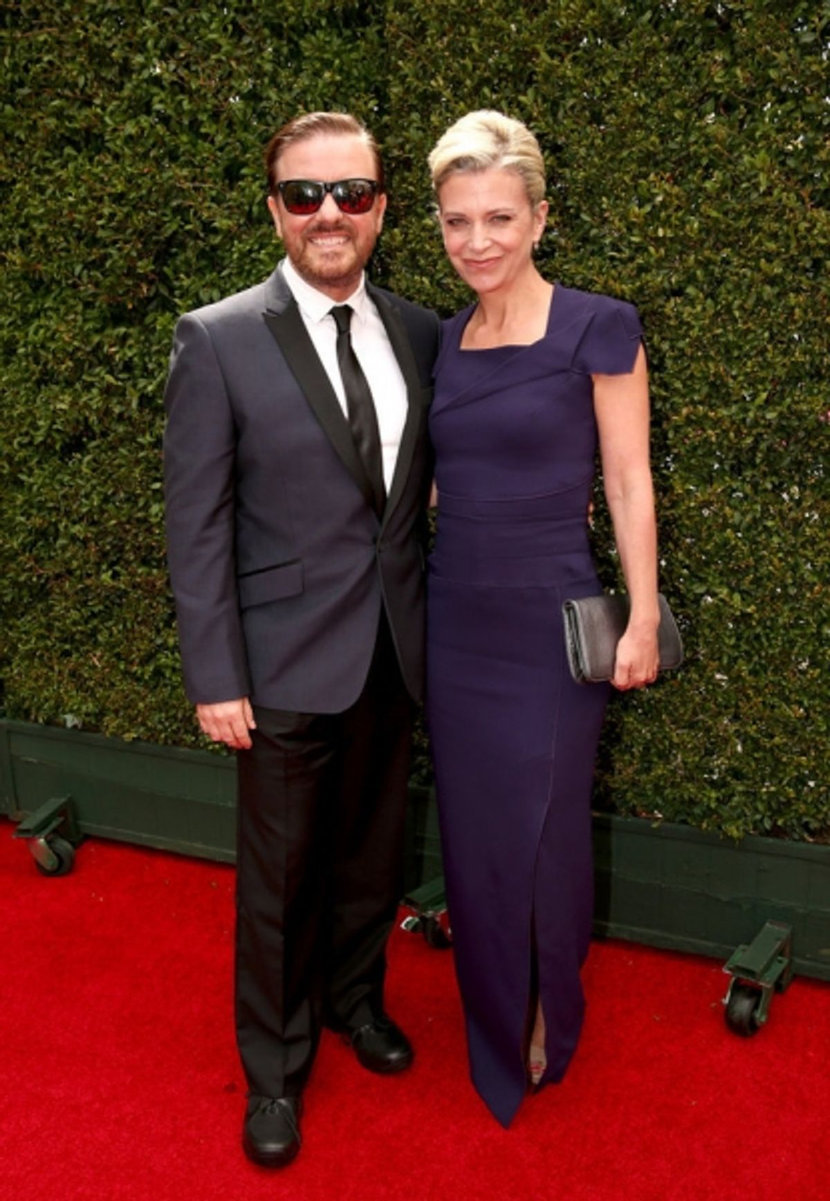 66th ANNUAL PRIMETIME EMMY AWARDS -- Pictured: (l-r) Actor/comedian Ricky Gervais and writer Jane Fallon arrive to the 66th Annual Primetime Emmy Awards held at the Nokia Theater on August 25, 2014 --  (Photo by: Christopher Polk/NBC) at 