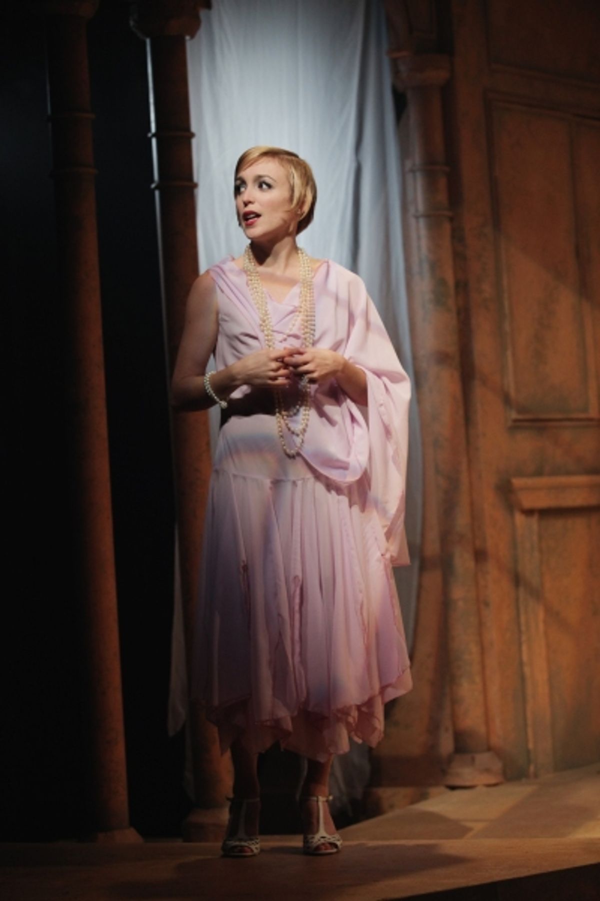 Sara Clark as Daisy Buchanan at 