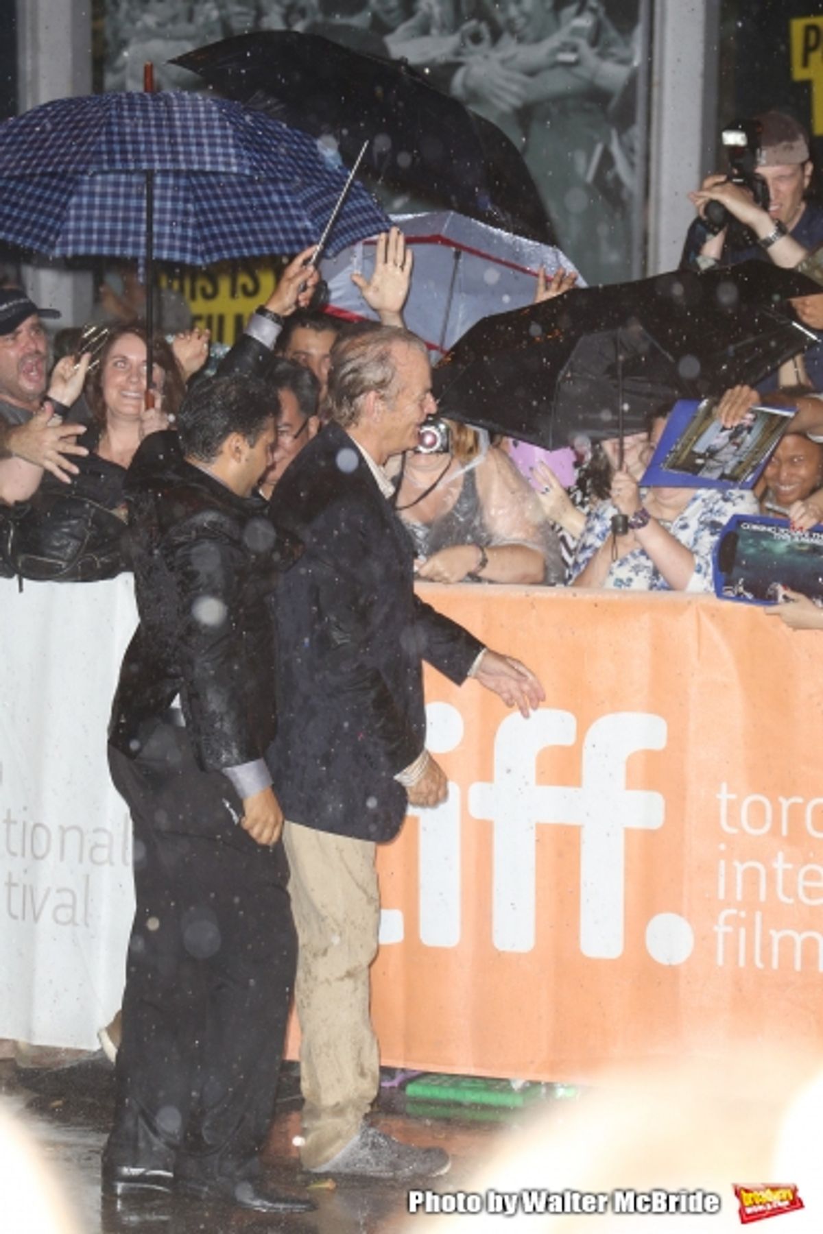 Bill Murray meets fans in the rain  at 