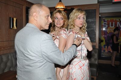 Dr. Barry Kohn gives Emily Padgett and Erin Davie Flu shots Photo