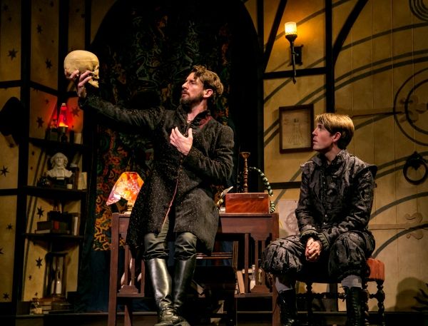 Professor John Faustus (Anthony Marble) debates fate and fate with his pupil, Hamlet  Photo