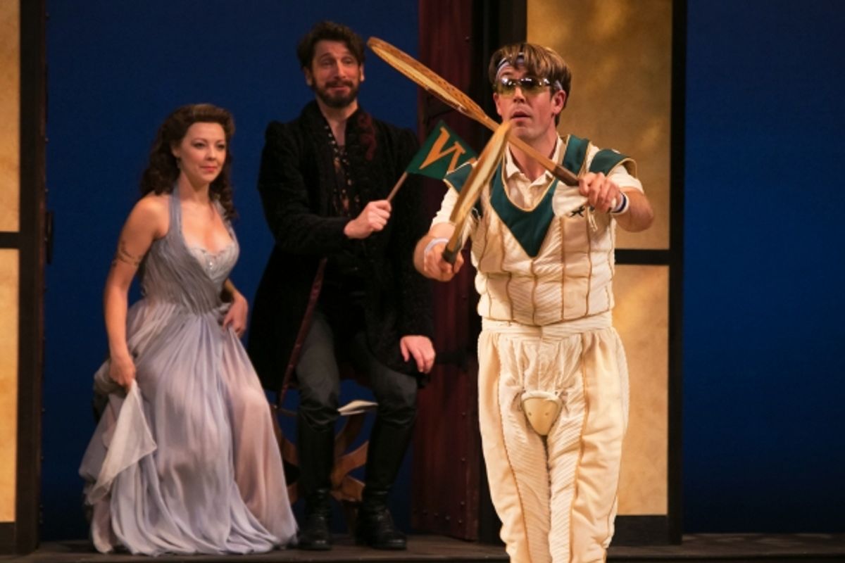 Young Prince Hamlet (foreground, Jordan Coughtry) celebrates a varsity tennis victory as Helen and John Faustus watch (background, Erin Partin and Anthony Marble).  at 