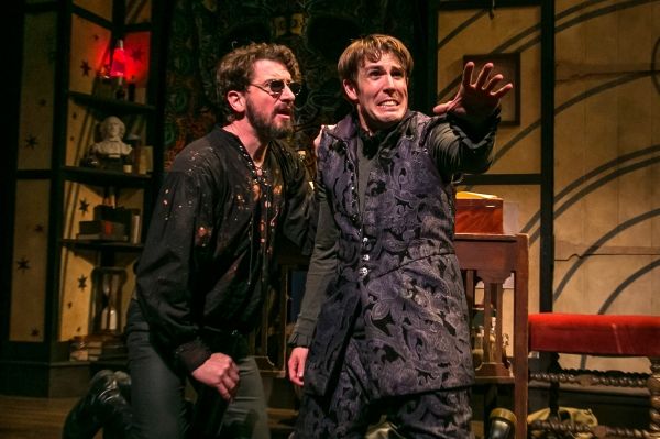 Maverick philosophy professor John Faustus (Anthony Marble) and a desperate Hamel (Jo Photo