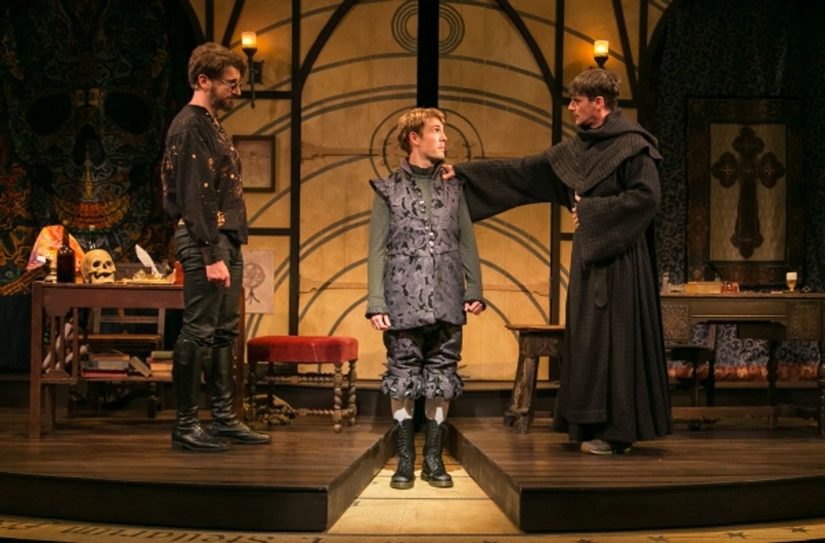 Professors John Faustus (Anthony Marble, left) and Martin Luther (Mark H. Dold, right) advise the wavering Hamlet (Jordan Coughtry, center). at 