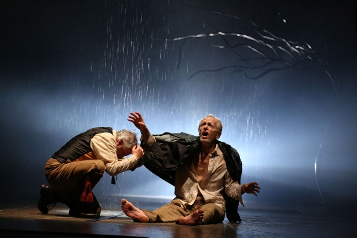 The Fool (Ross Lehman) shelters from the storm with the destitute King Lear (Larry Yando)  at 