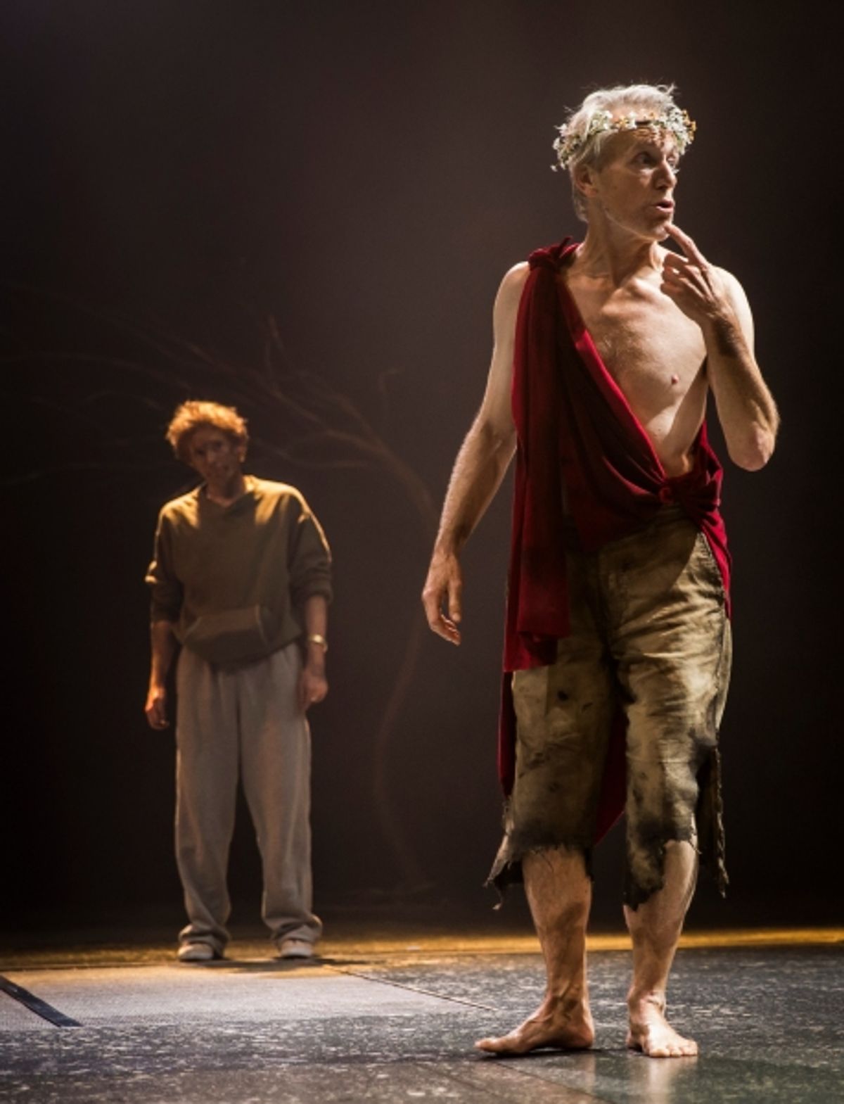 King Lear (Larry Yando, at right) is increasingly obscured by the shadows of dementia, accompanied by Edgar in disguise as Poor Tom (Steve Haggard) at 