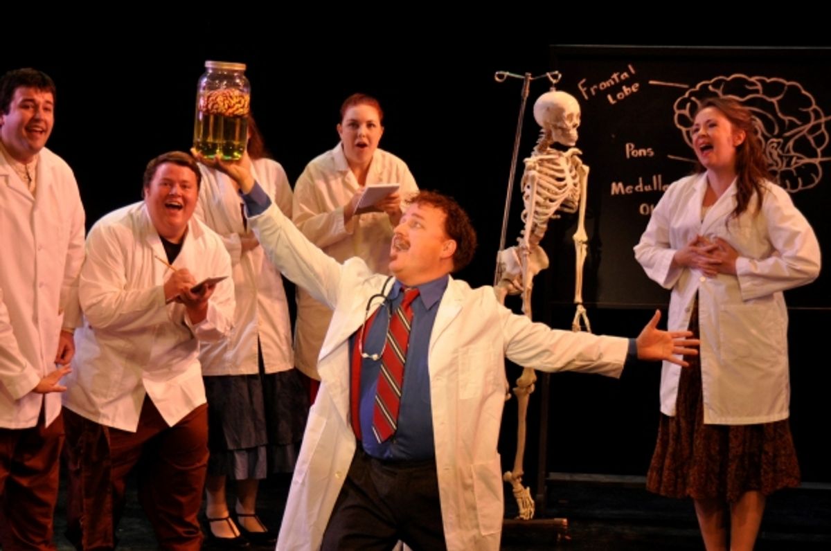 Dr. Frederick Frankenstein (R. MichaelClinscales) celebrates the brain with his medical school students. Photo by Tom Brown. at 