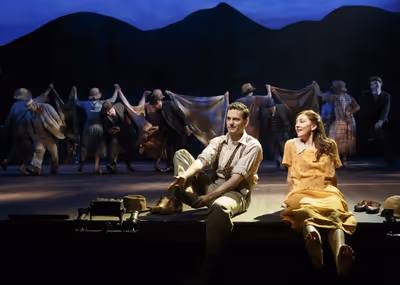 Wayne Alan Wilcox as Jimmy Ray Dobbs and Carmen Cusack as Alice Murphy with the cast Photo